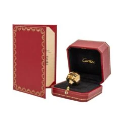 Bague CARTIER, "Yjing",en Or Jaune Et Œil De Tigre -Castafiore Boutique bague cartier yjing en or jaune et oeil de tigre 797067