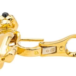 Boucles D'oreilles Clip CARTIER "Panthère" En Or Jaune, Or Blanc, Grenats Et Onyx -Castafiore Boutique boucles doreilles cartier panthere en or jaune et or blanc 818590