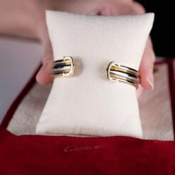 Bracelet CARTIER "Double C Trinity" Trois Ors 7 Bracelet CARTIER "Double C Trinity" Trois Ors -Castafiore Boutique bracelet cartier double c trinity trois ors 200334