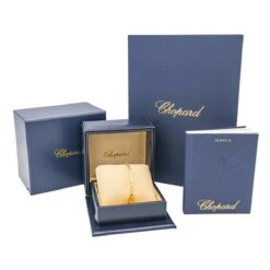 Bracelet Jonc CHOPARD "Ice Cube" En Or Jaune Et Diamants -Castafiore Boutique bracelet jonc chopard ice cube en or jaune et diamants 444571