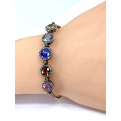 Bracelet Jonc En Or 18 Carats, Multipierres: Saphir,topazes,citrine. Epoque Napoléon III 24 Bracelet Jonc En Or 18 Carats, Multipierres: Saphir,topazes,citrine. Epoque Napoléon III -Castafiore Boutique bracelet jonc en or 18 carats multipierres saphirtopazescitrine epoque napoleon iii 467941