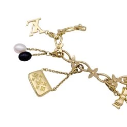 Miller Bracelet Louis Vuitton, "Idylle",breloques, Or Jaune, Or Blanc, Perles. 13 Miller Bracelet Louis Vuitton, "Idylle",breloques, Or Jaune, Or Blanc, Perles. -Castafiore Boutique bracelet louis vuitton idylle breloques or jaune or blanc perles 619242
