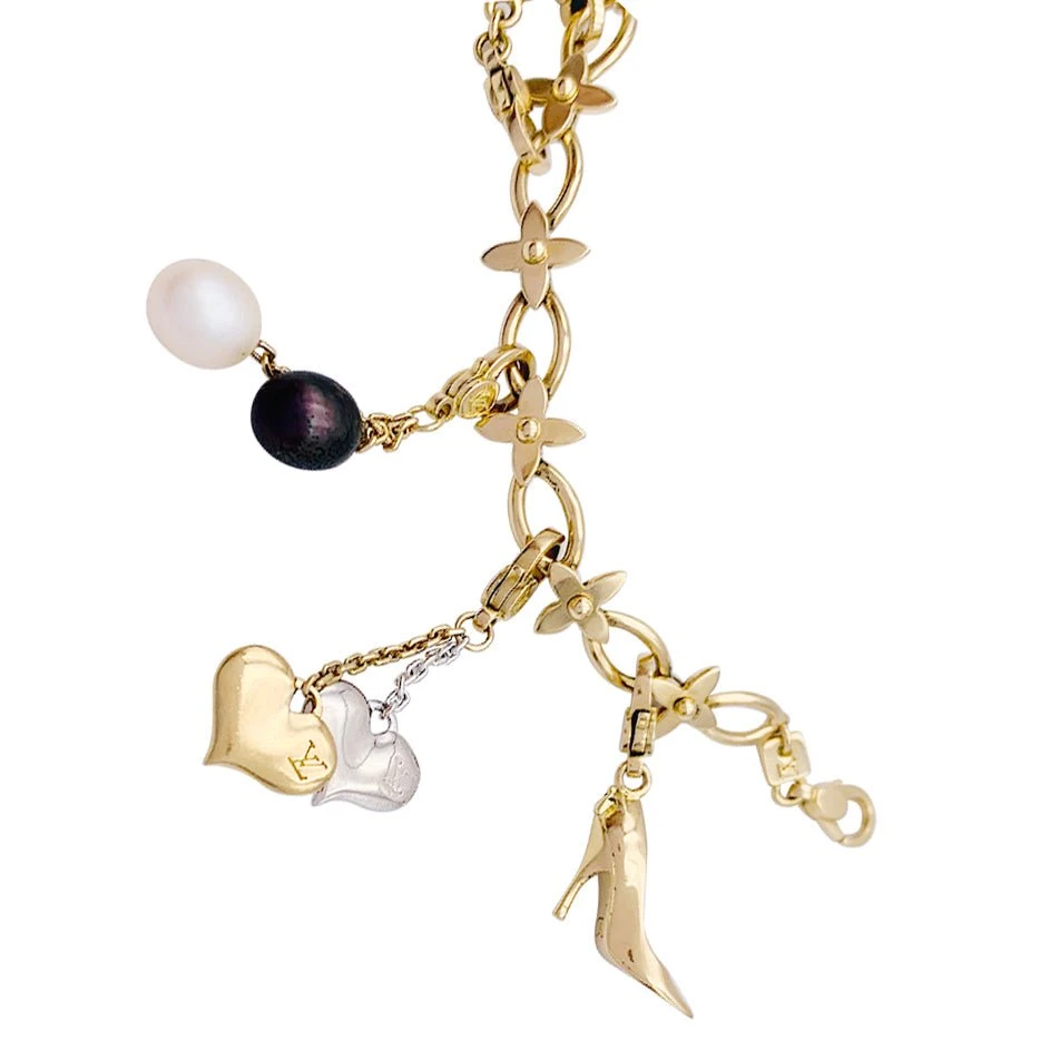 Miller Bracelet Louis Vuitton, "Idylle",breloques, Or Jaune, Or Blanc, Perles. 6 Miller Bracelet Louis Vuitton, "Idylle",breloques, Or Jaune, Or Blanc, Perles. – Image 6