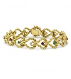 Bracelet - Or. Diamants. Rubis & émeraudes