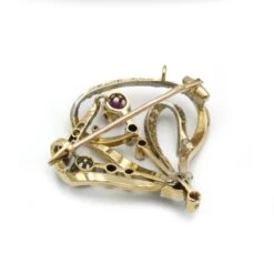 Broche En Or Jaune, Platine, Rubis Et Diamants -Castafiore Boutique broche or diamants rubis 940097