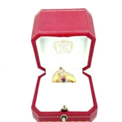 Bague CARTIER "Menottes" En Or Rose, Tourmaline Et Diamants 13 Bague CARTIER "Menottes" En Or Rose, Tourmaline Et Diamants -Castafiore Boutique cartier menotte bague bypass en or rose 18ct avec diamants et tourmaline rose 350639