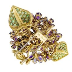 Miller Clip René Boivin,"Bouquet De Violettes", Or Jaune, Gemmes De Couleur. 12 Miller Clip René Boivin,"Bouquet De Violettes", Or Jaune, Gemmes De Couleur. -Castafiore Boutique clip rene boivinbouquet de violettes or jaune gemmes de couleur 269401