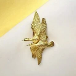 HERMÈS Par GEORGES LENFANT Broche « Canards » -Castafiore Boutique hermes par georges lenfant broche canards 991419