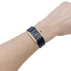 Miller Montre CARTIER "Tank Must" En Argent Et Cuir -Castafiore Boutique montre cartier tank must argent plaque or cadran laque noir 369744