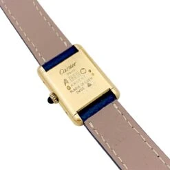 Miller Montre CARTIER "Tank Must" En Argent Et Cuir -Castafiore Boutique montre cartier tank must argent plaque or cadran laque noir 483360