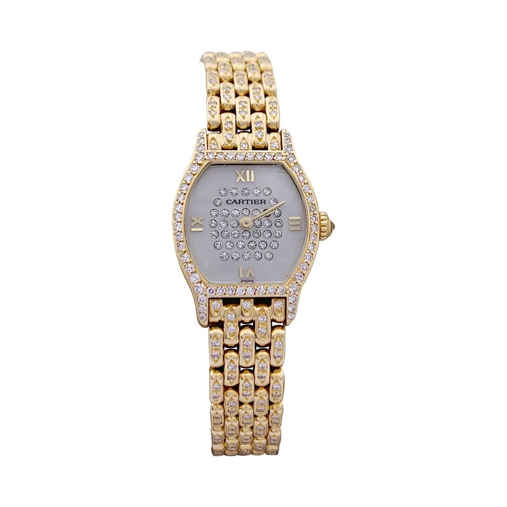 Miller Montre Cartier "Tortue" Or Jaune, Diamants, Nacre. 1 Miller Montre Cartier "Tortue" Or Jaune, Diamants, Nacre.