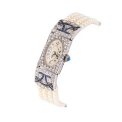 Montre De Dame Art Déco En Or Blanc, Perles, Saphirs Et Diamants -Castafiore Boutique montre de dame art deco en or blanc perles saphirs et diamants 272213