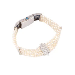 Montre De Dame Art Déco En Or Blanc, Perles, Saphirs Et Diamants -Castafiore Boutique montre de dame art deco en or blanc perles saphirs et diamants 769894