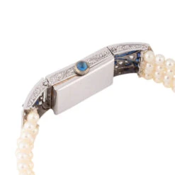 Montre De Dame Art Déco En Or Blanc, Perles, Saphirs Et Diamants -Castafiore Boutique montre de dame art deco en or blanc perles saphirs et diamants 892627