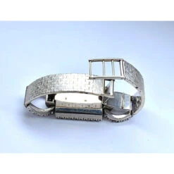 Montre Mécanique En Or Et Diamants -Castafiore Boutique montre en or blanc 18 carats sertie de diamants 593453