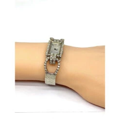 Montre Mécanique En Or Et Diamants -Castafiore Boutique montre en or blanc 18 carats sertie de diamants 770137