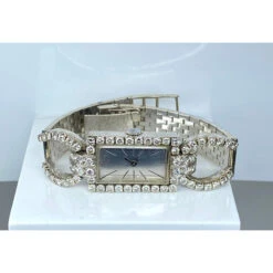 Montre Mécanique En Or Et Diamants -Castafiore Boutique montre en or blanc 18 carats sertie de diamants 969370