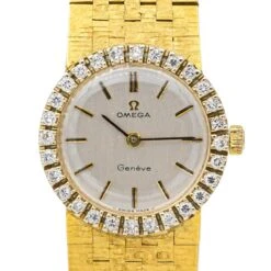 Montre OMEGA En Or Jaune, Saphir Et Diamants -Castafiore Boutique montre omega en or jaune saphir et diamants 5215393
