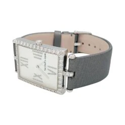 Miller Montre Quartz VAN CLEEF & ARPELS "Classique Arpels" En Or Blanc, Nacre, Satin Et Diamants 13 Miller Montre Quartz VAN CLEEF & ARPELS "Classique Arpels" En Or Blanc, Nacre, Satin Et Diamants -Castafiore Boutique montre van cleef arpels classique arpels en or blanc diamants nacre et satin 743459
